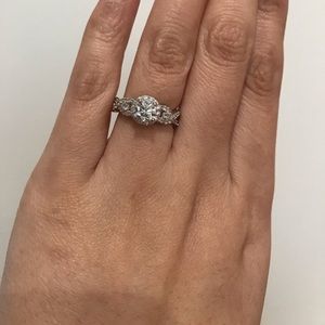 New silver round halo twisted engagement ring